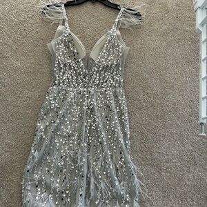 Homecoming size 3 dress. Silver color NWT!